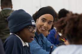 Student working with staff at IntoNewcastle centre in Newcastle