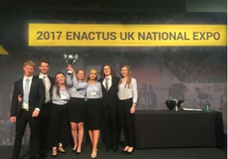 a group of people posing for the camera