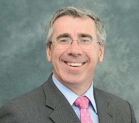 a man wearing a suit and tie