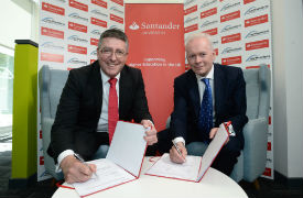 a group of people standing in front of a store