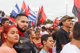 a group of people standing in front of a crowd