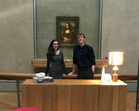 a group of people sitting at a table