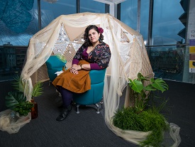 a person sitting on a bed