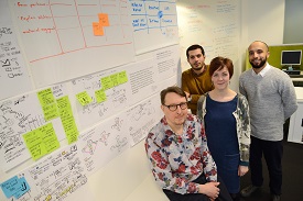 a group of people posing for the camera