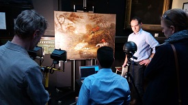 a group of people looking at each other