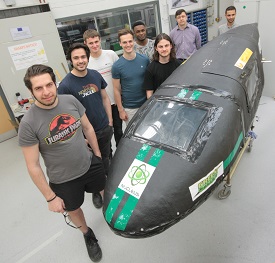 a group of people posing for the camera