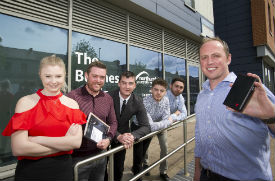 a group of people posing for the camera