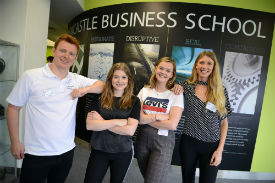 a group of people posing for a photo