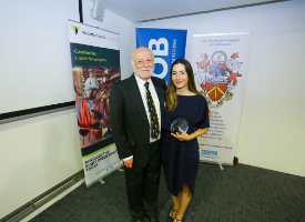 a person standing in front of a refrigerator