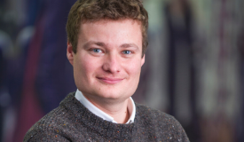 a man smiling for the camera