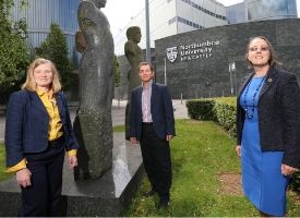 a group of people posing for the camera