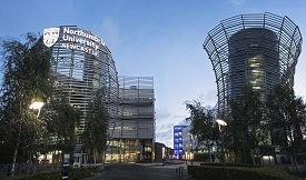 Photo of Northumbria University's City Campous East, with the Northumbria University logo at the top of the building