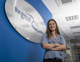 a person standing in front of a building