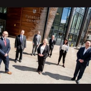people standing in courtyard