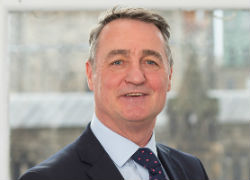 a man wearing a suit and tie