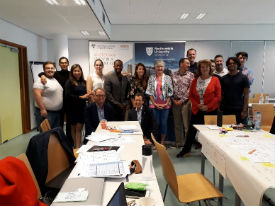 a group of people sitting at a table