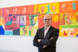 a man standing in front of a store