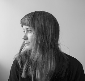 a woman looking at the camera