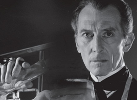 Close up of a mans face from the poster for Hammer and beyond