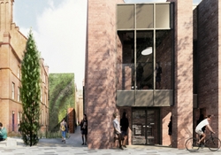 a group of people walking down a street next to a building