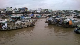 a boat is docked next to a body of water