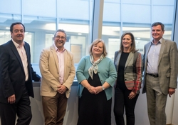 a group of people posing for a photo