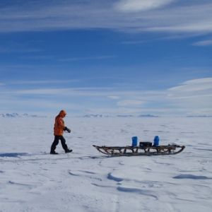 a group of people that are standing in the snow