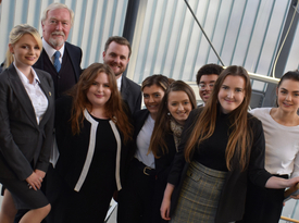 a group of people posing for the camera