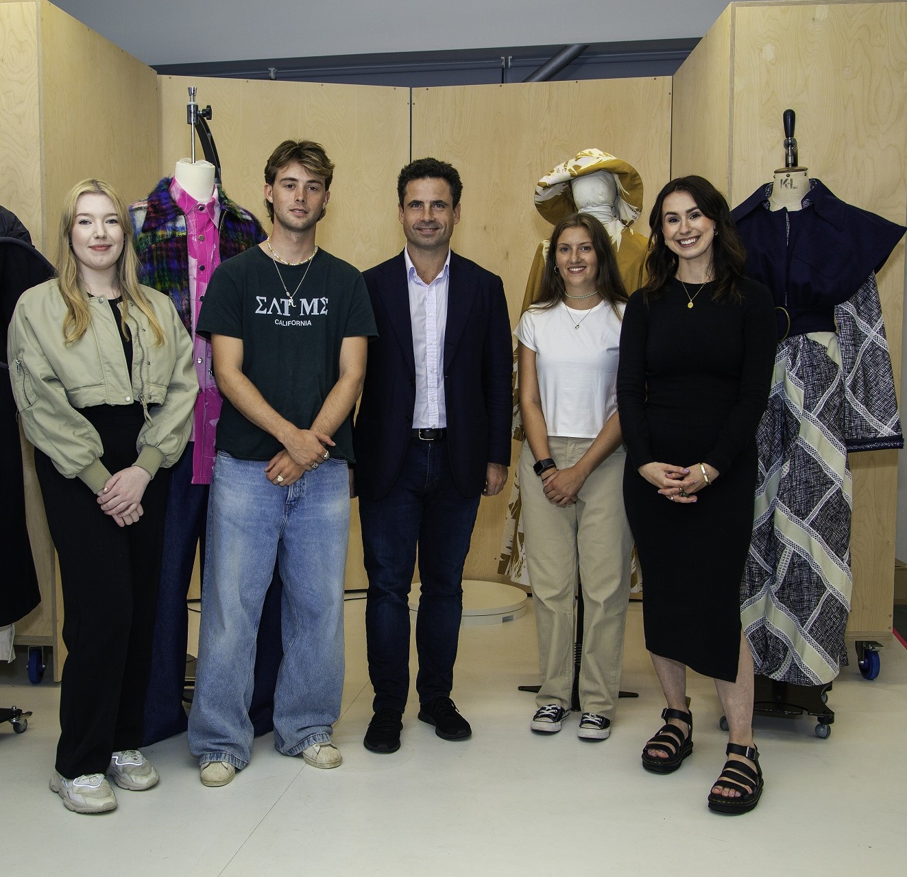 Fashion graduates Emily Gibson Will HowardJones Holly Hooker and Melissa Newton with Leo Fenwick centre