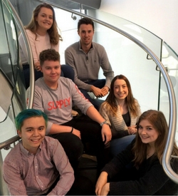 a group of people posing for the camera