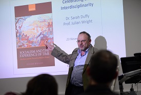 a group of people standing in a room