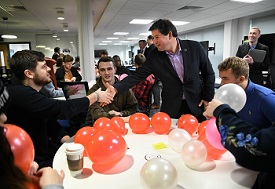 a group of people sitting at a table