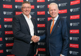 a person holding a sign