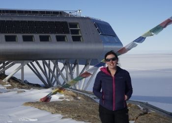 a man standing in front of a building