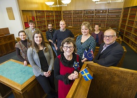 a group of people posing for the camera