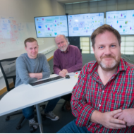 a group of people sitting at a table