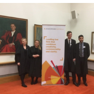 a group of people standing in a room