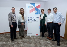 a group of people posing for the camera