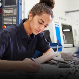 woman writting on paper