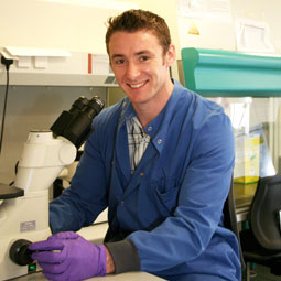 a person standing in a kitchen