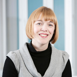 a woman smiling for the camera