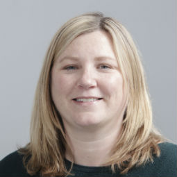 a woman smiling for the camera