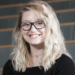 a woman smiling for the camera