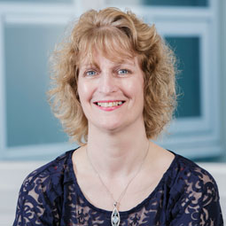 a woman smiling for the camera