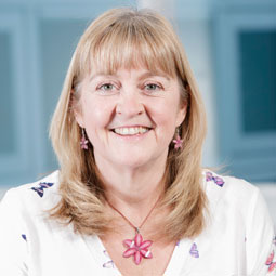 a woman smiling for the camera