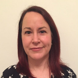 a woman smiling for the camera