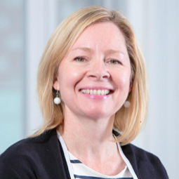 a woman smiling for the camera