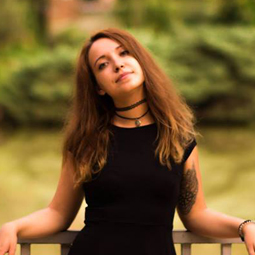 a woman standing in a park