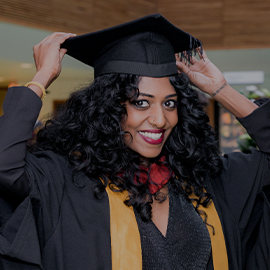 smiling student at graduation