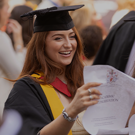 smiling student at graduation